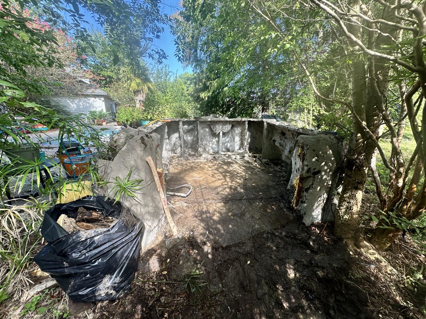 After: the hot tub removed and the surround cleared